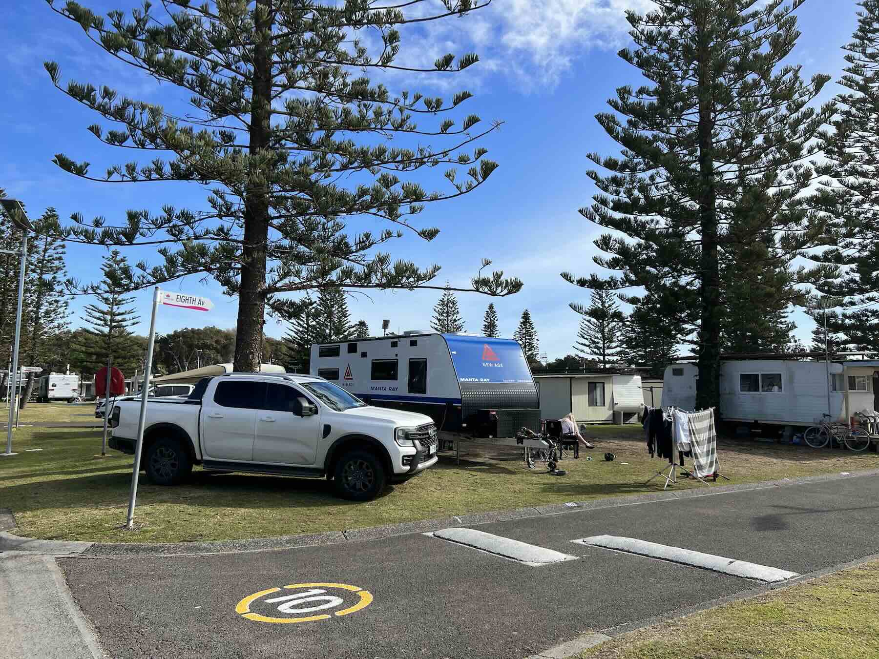 Long caravan site with drive-through access — the big-rig standard